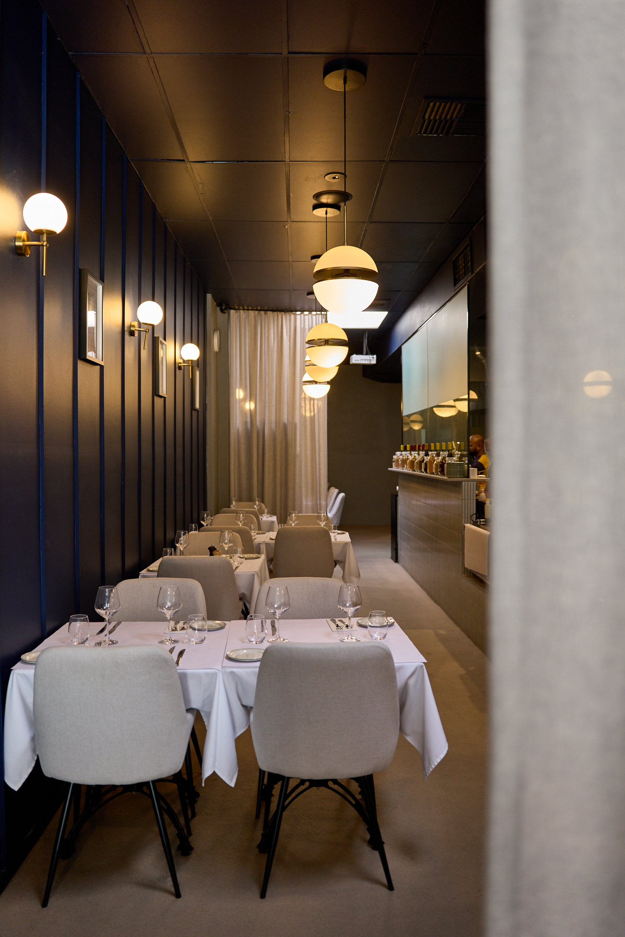 Paneer Tikka skewer with grilled capsicum and onion on a banana leaf, served with chutneys and a rose drink